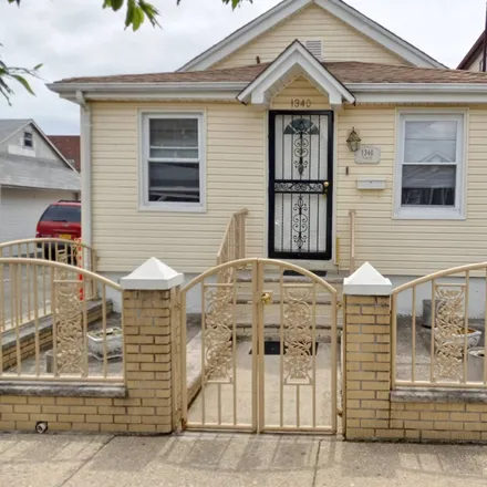 Buy this 3 bed house on 1328 East 98th Street in New York, NY 11236
