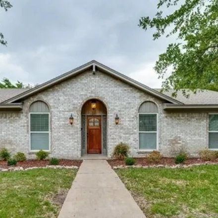 Rent this 4 bed house on 7635 Querida Lane in Dallas, TX 75248