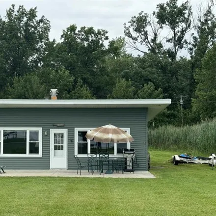 Buy this 2 bed house on 3130 S Channel Dr in Harsens Island, Michigan