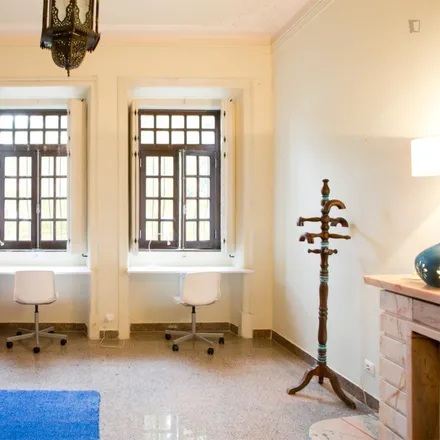 Rent this 4 bed room on Rua Doutor José Joaquim de Almeida 17 in 2780-337 Oeiras, Portugal