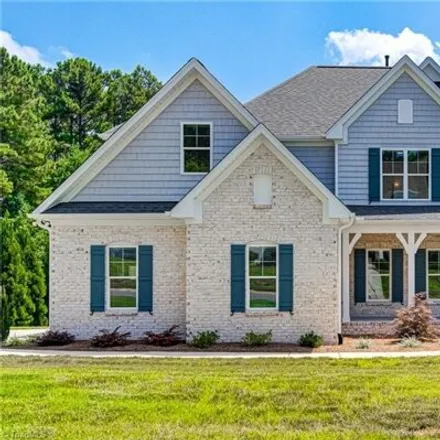 Buy this 4 bed house on 1892 Woodstock Road in Forsyth County, NC 27012