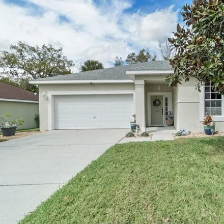 Buy this 3 bed house on 1246 Meadow Lark Drive in Titusville, FL 32780