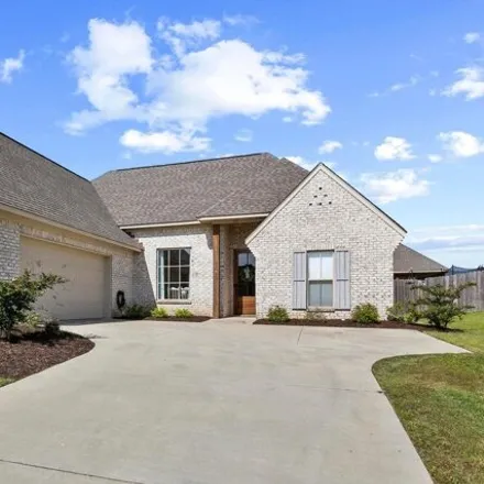 Rent this 3 bed house on 313 E Buttonwood Ln in Canton, Mississippi