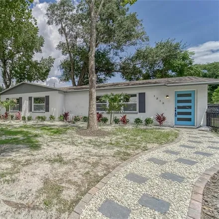 Buy this 3 bed house on 1213 East Ellicott Street in Tampa, FL 33603