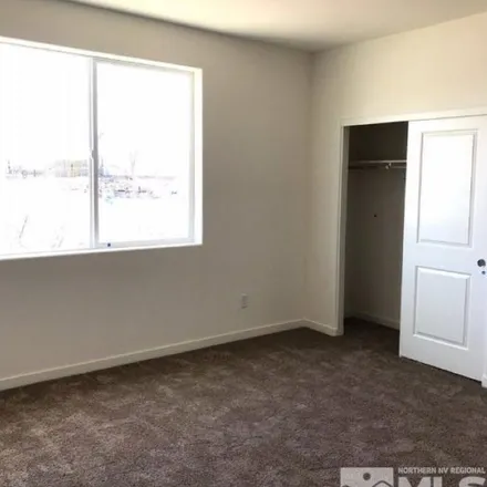 Rent this 2 bed townhouse on 498 Ciara Kennedy Lane in Reno, NV 89503