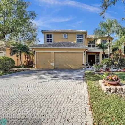 Buy this 5 bed house on 4973 115th Way in Coral Springs, FL 33076