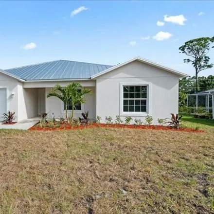 Buy this 4 bed house on 345 Eckert Street Southeast in Palm Bay, FL 32909
