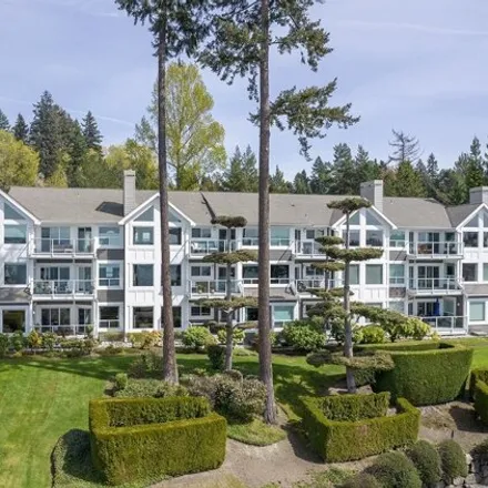 Buy this 2 bed condo on 103rd Way Northeast in Kirkland, WA 98033