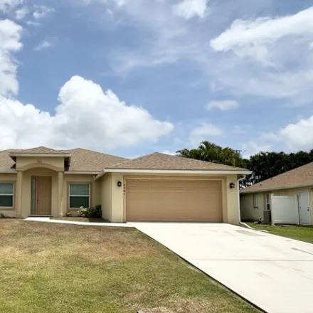 Buy this 4 bed house on 1160 Southwest Kapok Avenue in Port Saint Lucie, FL 34953