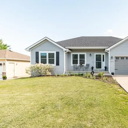 Buy this 4 bed house on 1705 Golden Rain Drive in Lawrence, KS 66044