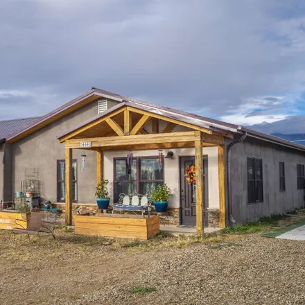 Buy this 2 bed house on 302 Camino de la Merced in Taos, NM 87571