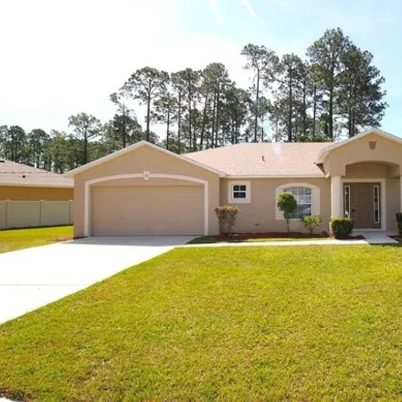 Rent this 3 bed house on 86 Ryding Lane in Palm Coast, FL 32164