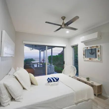 Rent this 4 bed house on Machans Beach QLD 4878