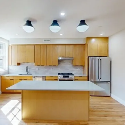 Rent this 4 bed apartment on 145 Sutherland Road in Boston, MA 02135