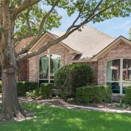 Buy this 4 bed house on 8802 Lakeport Dr in Rowlett, Texas