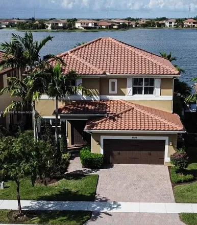 Buy this 4 bed house on 9709 Blue Isle Bay in Parkland, FL 33076