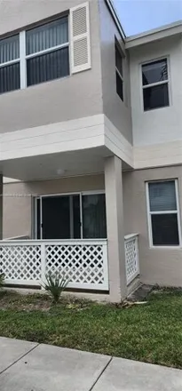 Rent this 2 bed condo on 6725 Northwest 174th Terrace in Miami-Dade County, FL 33015