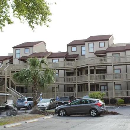 Buy this 2 bed condo on Dunes Golf & Beach Club in Kings Road Extension, Horry County