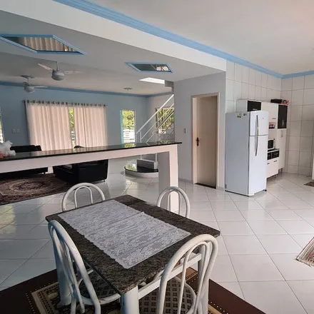 Rent this 3 bed townhouse on Caraguatatuba