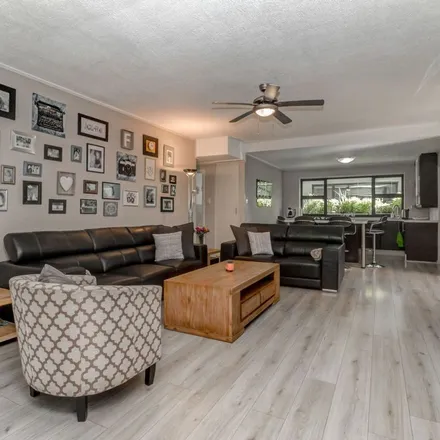 Rent this 3 bed apartment on Lake Saran Close in Cedar Lakes, Randburg
