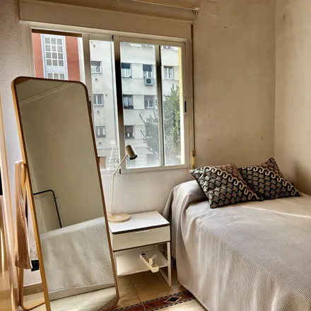 Rent this 1 bed room on Calle Marqués del Vasto in 28003 Madrid, Spain