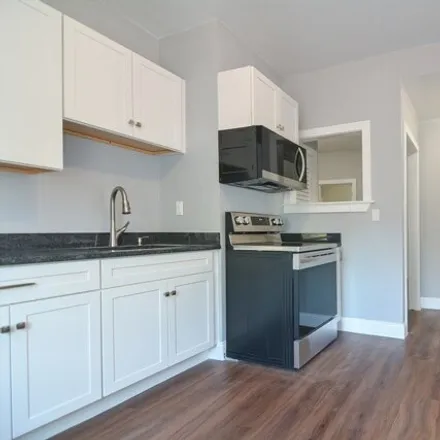 Rent this 4 bed apartment on 44 Arbutus Street in Boston, MA 02126