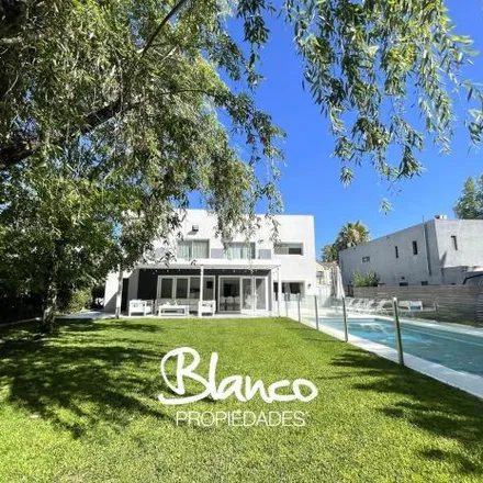 Buy this 4 bed house on unnamed road in La Lonja, B1631 BUI Buenos Aires