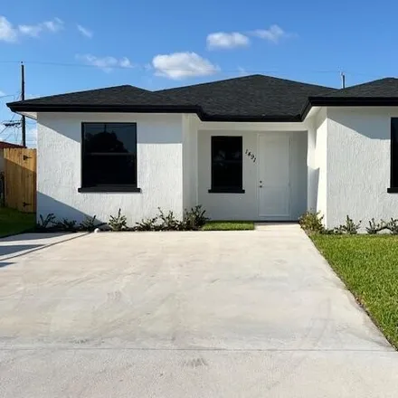 Buy this 5 bed house on 1491 West 30th Street in Riviera Beach, FL 33404