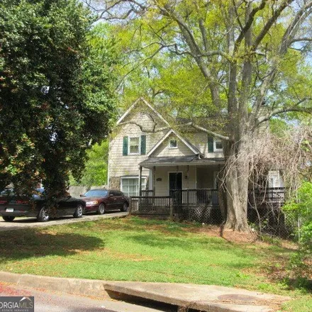 Buy this 3 bed house on 3816 Charlotte Drive in Clayton County, GA 30273