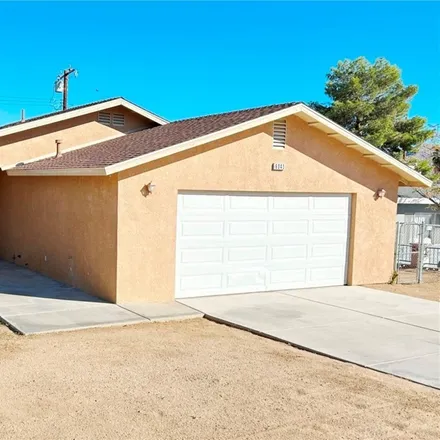 Rent this 3 bed house on 6045 Mojave Avenue in Smoke Tree, Twentynine Palms