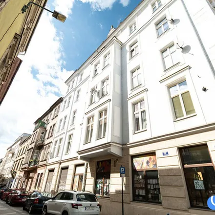 Rent this 2 bed apartment on Curry Up! in Krakowska 29, 31-062 Krakow