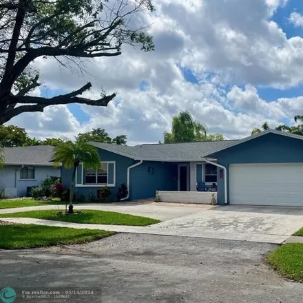 Buy this 3 bed house on 7650 Plantation Road in Plantation, FL 33324