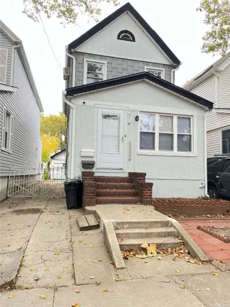 Rent this 3 bed house on 69-13 Olcott Street in New York, NY 11375