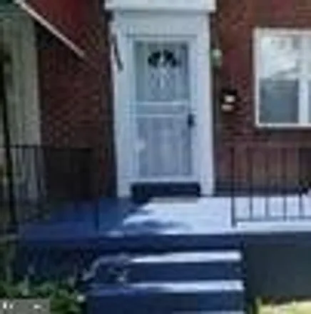 Rent this 2 bed townhouse on 2800 Windsor Avenue in Baltimore, MD 21216