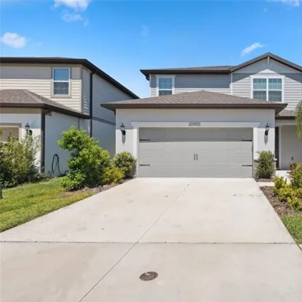Buy this 4 bed house on Monza Loop in Pasco County, FL 34638