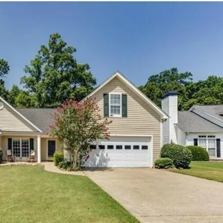 Rent this 4 bed house on 5792 Tattersall Terrace in Gwinnett County, GA 30518