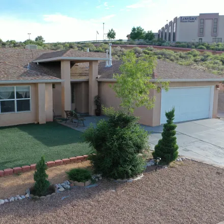 Buy this 3 bed house on 4504 Tottle Avenue Northwest in Albuquerque, NM 87114