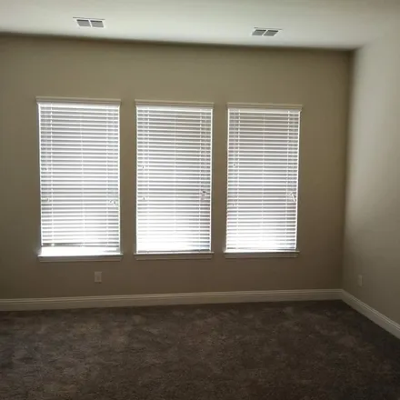 Rent this 4 bed apartment on 1525 Gallant Fox Drive in Rockwall, TX 75032
