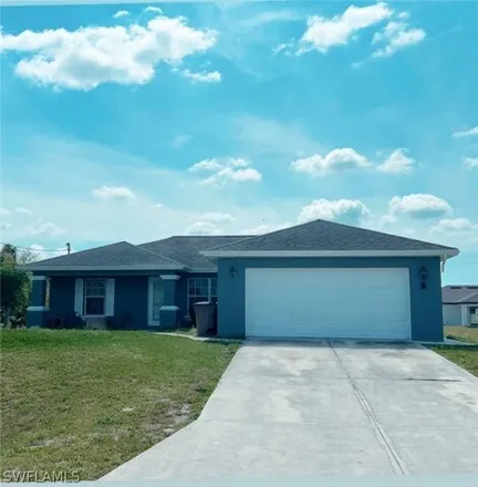 Buy this 3 bed house on 2657 4th Street Southwest in Lehigh Acres, FL 33976