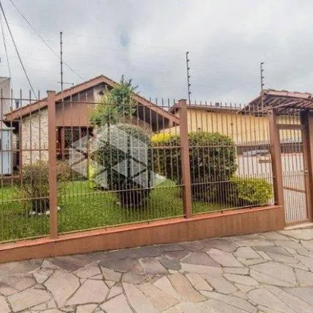 Buy this 4 bed house on Rua Doutor Mário Totta in Cavalhada, Porto Alegre - RS