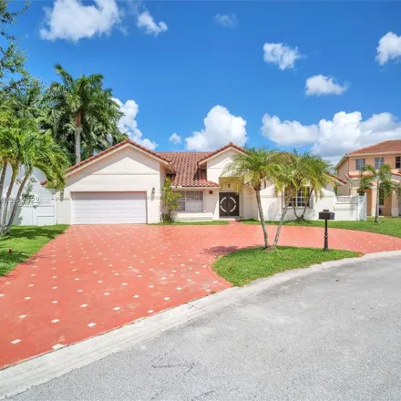 Buy this 4 bed house on 165 Northwest 164th Avenue in Pembroke Pines, FL 33028