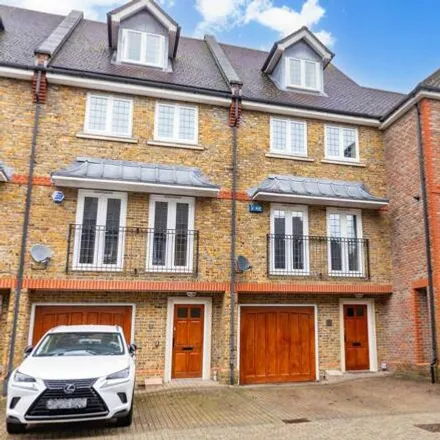 Buy this 4 bed townhouse on 7 Aspen Court in East Grinstead, RH19 4HG