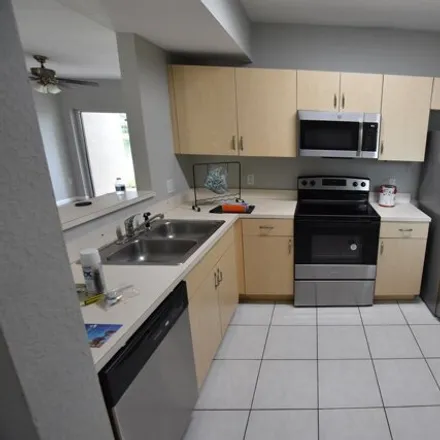 Rent this 3 bed condo on 1068 Golden Lakes Boulevard in Golden Lakes, Palm Beach County