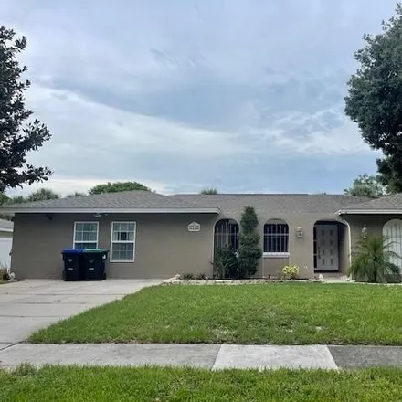 Rent this 4 bed house on 6246 Silver Glen Ct in Orlando, Florida