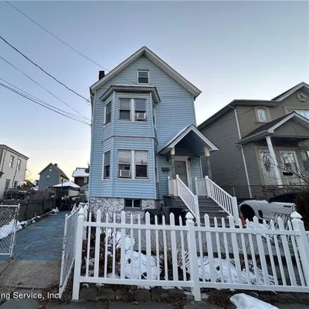 Buy this 7 bed house on 1048 Post Avenue in New York, NY 10302