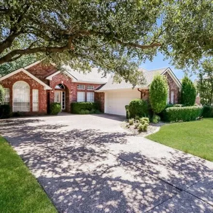 Rent this 4 bed house on 2321 Whisperton Drive in Arlington, TX 76016