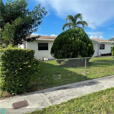 Buy this 4 bed house on 3810 Northwest 186th Street in Miami Gardens, FL 33055
