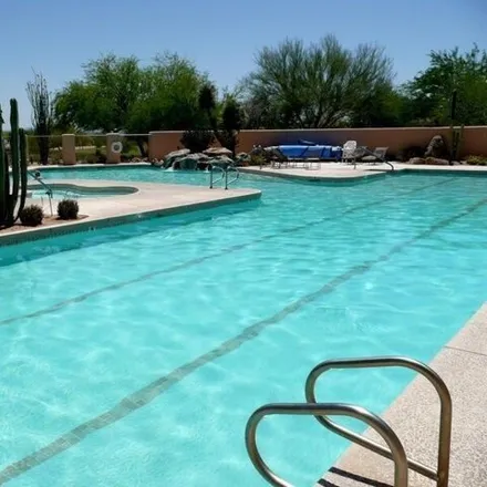 Rent this 4 bed house on 27905 North Desierto Drive in Maricopa County, AZ 85263