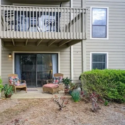Buy this 2 bed condo on 572 River Mill Circle in Roswell, GA 30075