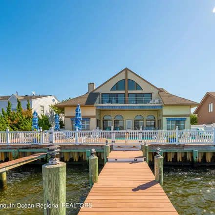Buy this 6 bed house on 213 Curtis Point Drive in South Mantoloking Beach, Brick Township